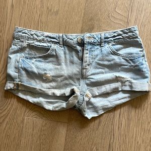 distressed light blue denim shorts